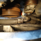 This slight wetness on the hose seems to indicate a weeping hose, but all of the other stuff around it also being gross might mean I had coolant leaking there?